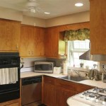 Kitchen Cabinets: Sanding And Restaining For A Refreshed Look